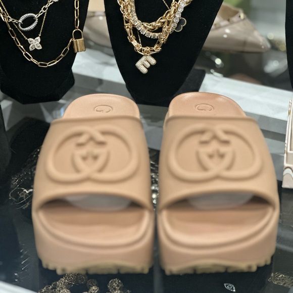 Gucci Tan Mules with Embossed Logo - Picture 1 of 9